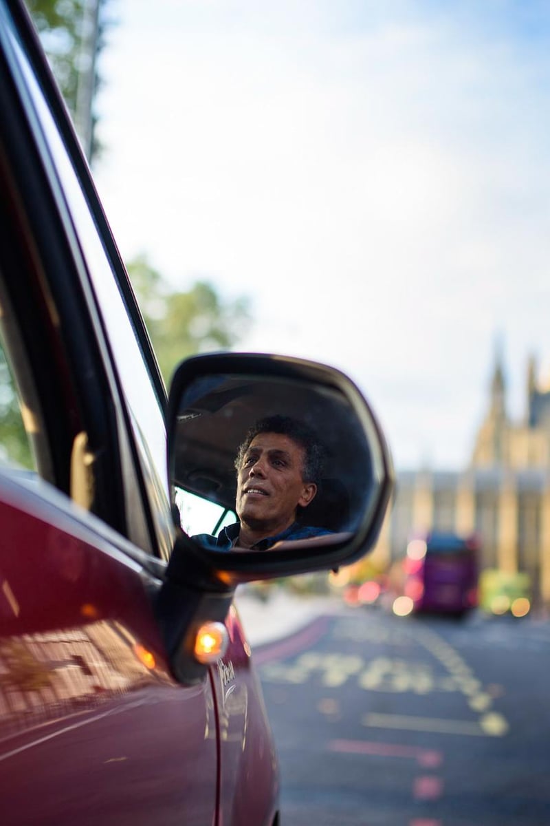 a person in a car mirror