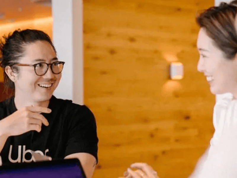 a person and person smiling at each other