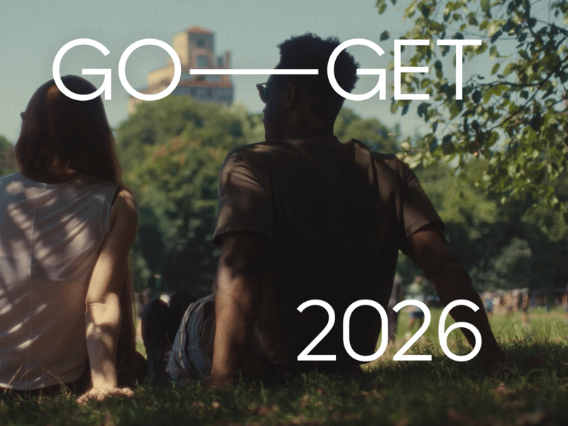 a person and person sitting on grass
