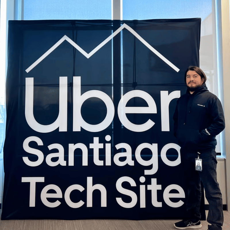a person standing in front of a large sign