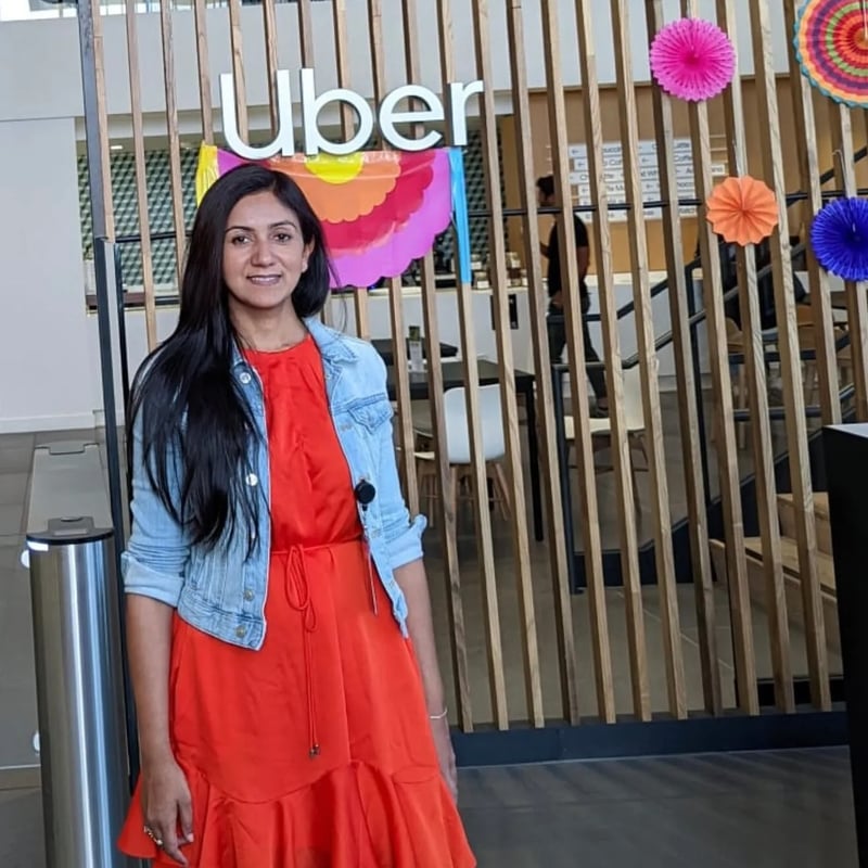 a person standing in front of a sign