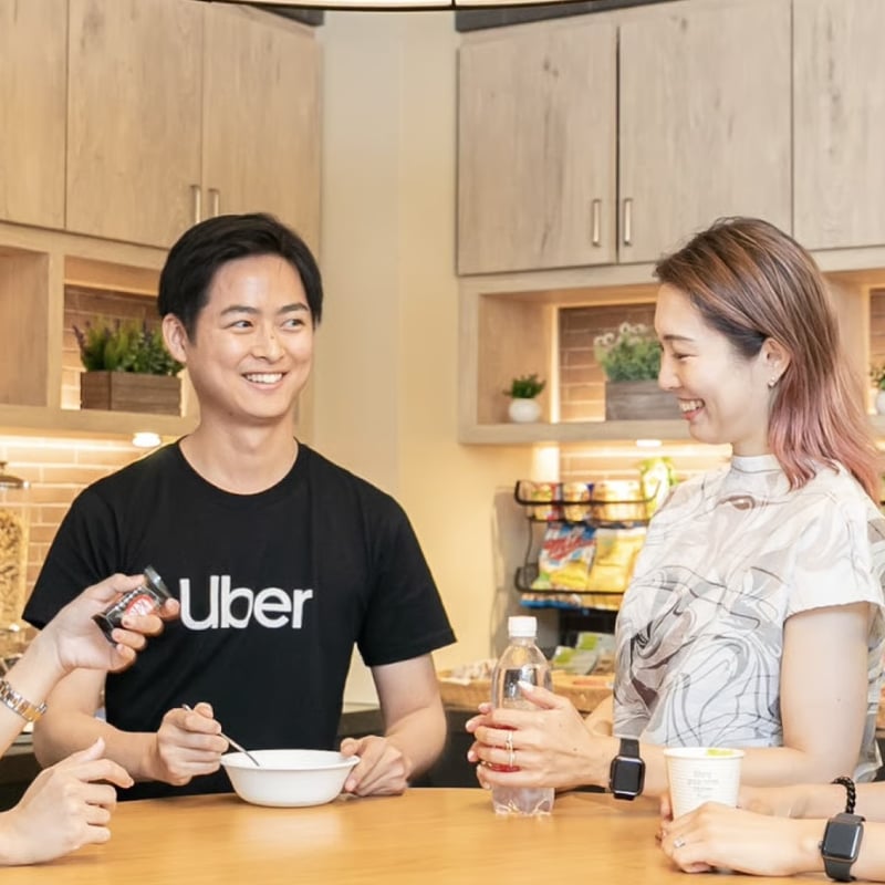 a group of people sitting at a table