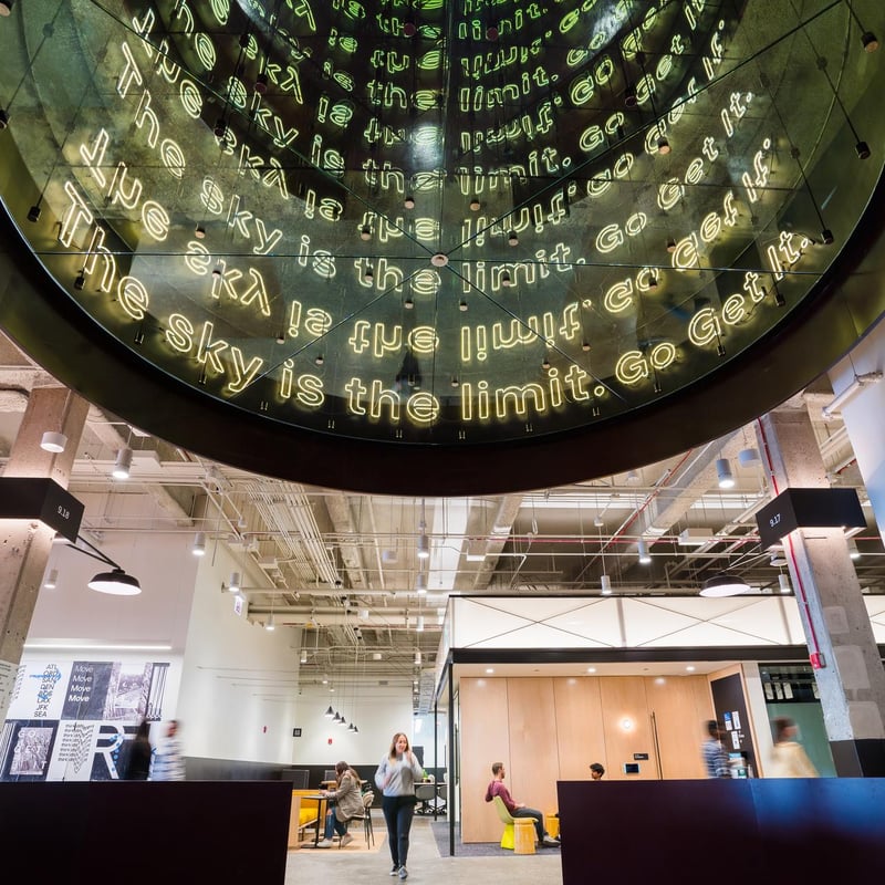 a large circular glass structure with text on it