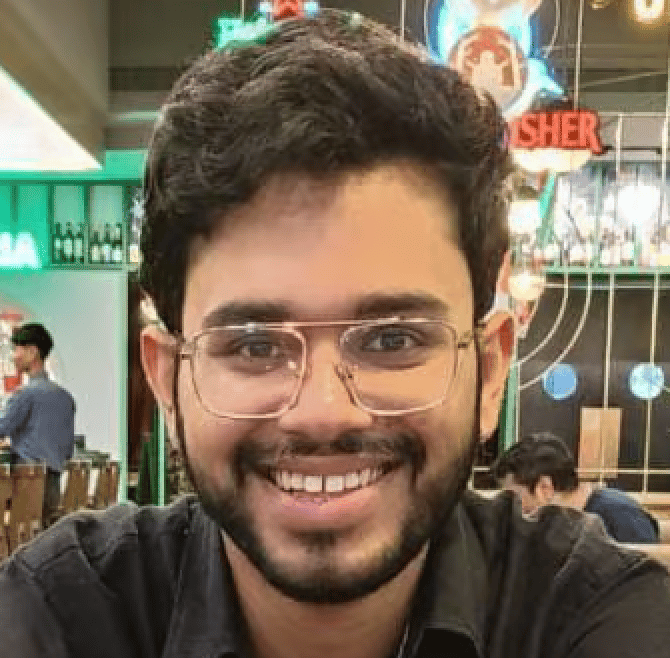 a person smiling at the camera