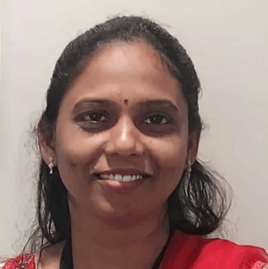 a person smiling at the camera