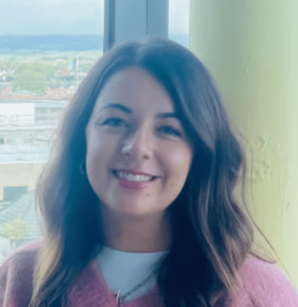 a person smiling at the camera
