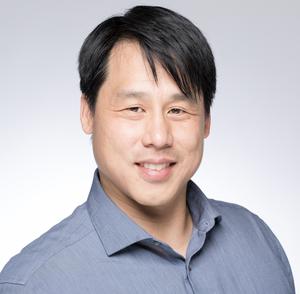 a person smiling at the camera