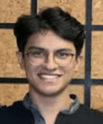 a person smiling at the camera