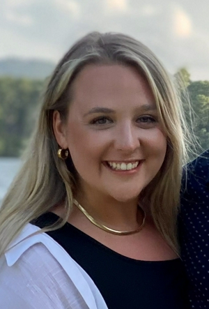 a person smiling at the camera