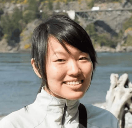 a person smiling at camera