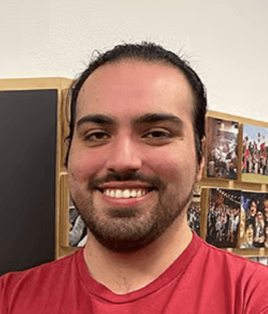 a person smiling at the camera
