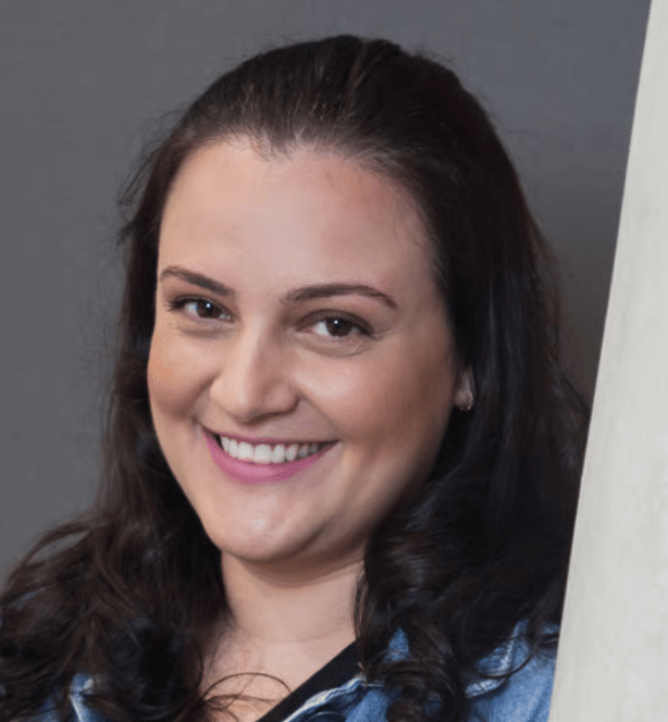 a person smiling at the camera