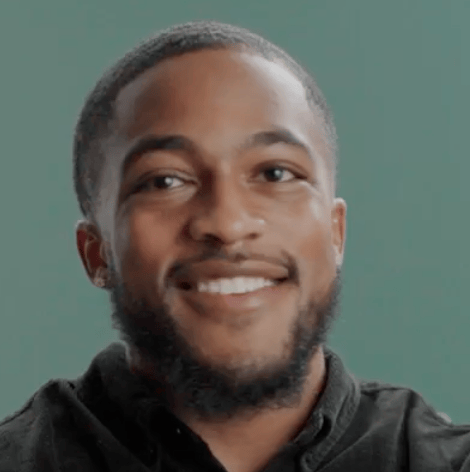 a person smiling for the camera