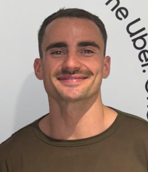 a person smiling for the camera