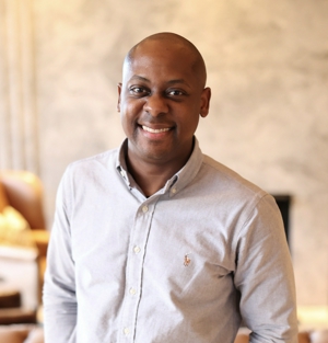 a person smiling at the camera