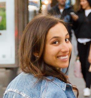 a person smiling at the camera