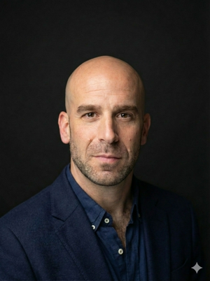 a bald person in a blue suit