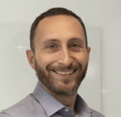 a person smiling for the camera