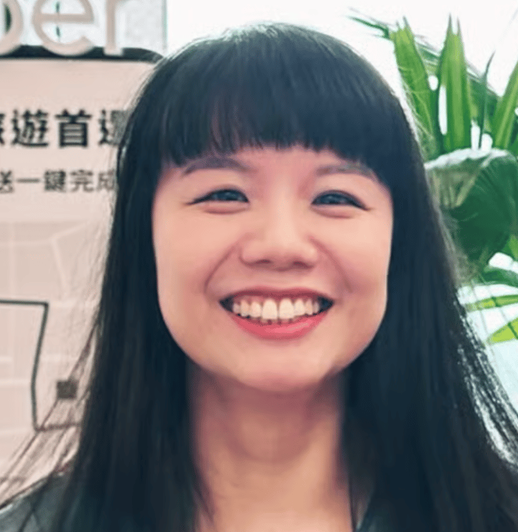 a person smiling at the camera