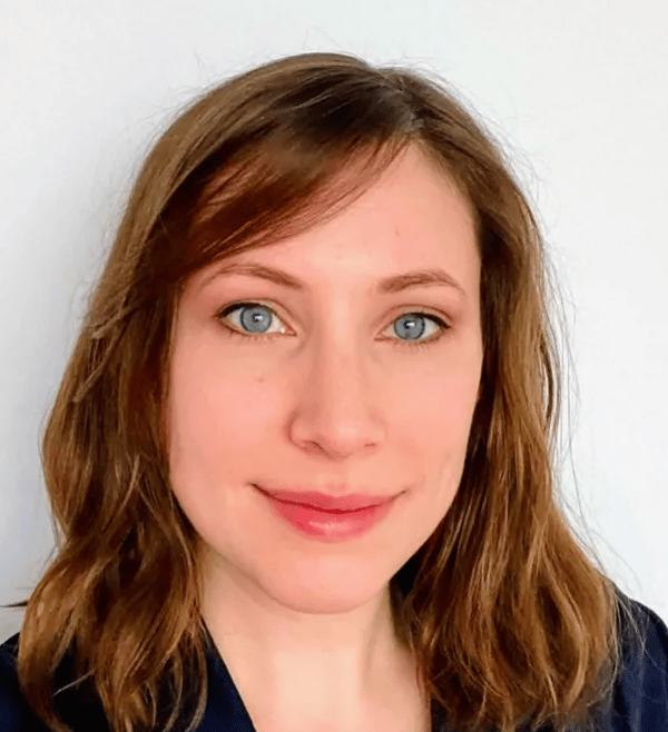 a person with blue eyes and brown hair