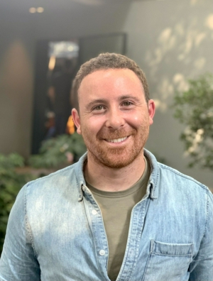 a person smiling at the camera