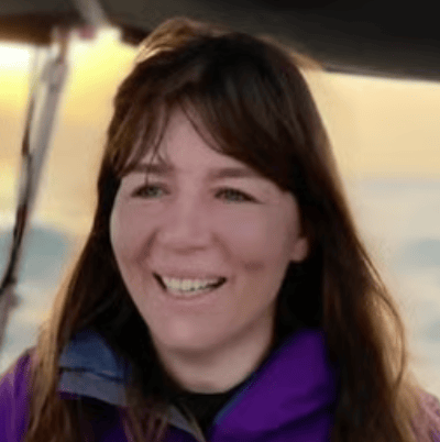 a person smiling at the camera